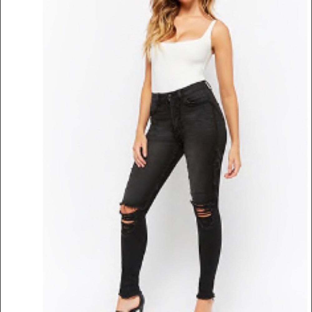 Distressed super skinny frayed trim jeans